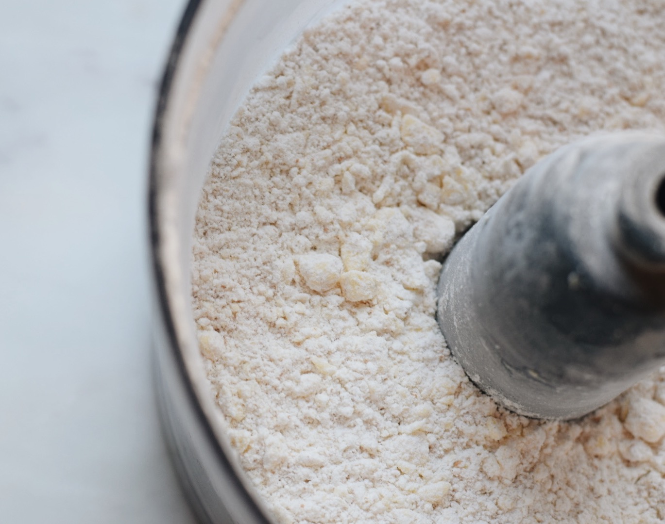 flour and butter in the food processor 
