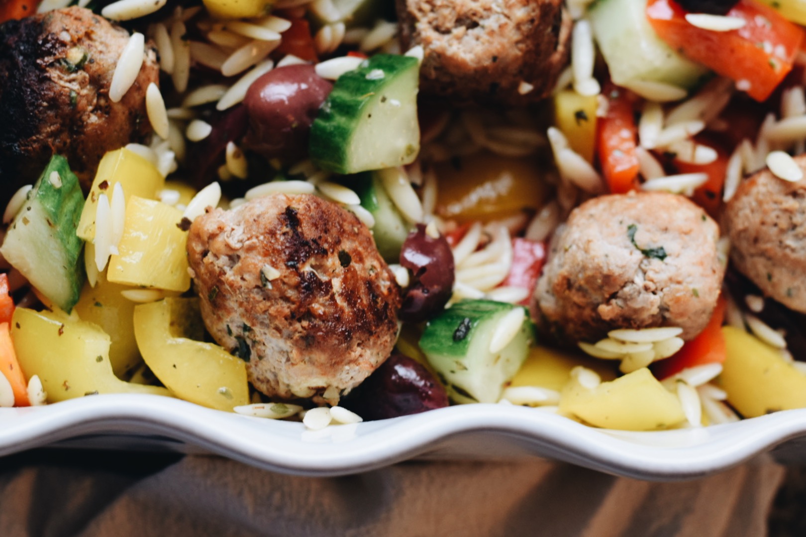 turkey meatball on a bed of orzo